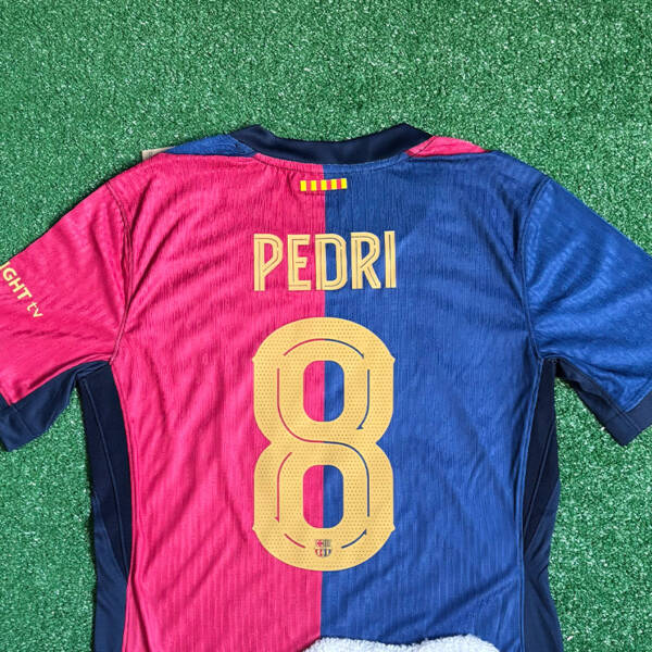 Maillot domicile FC Barcelone 2025 – Design traditionnel bleu et grenat avec logo Nike.
