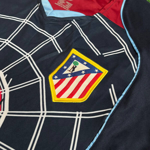 Maillot extérieur Atlético Madrid 2004-2005, porté par Fernando Torres.