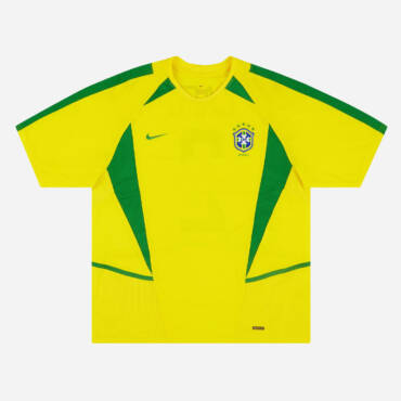 Maillot domicile Brésil 2002, jaune et vert, porté par Ronaldo lors de la victoire en Coupe du Monde.