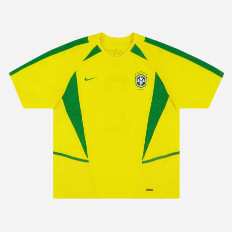 Maillot domicile Brésil 2002, jaune et vert, porté par Ronaldo lors de la victoire en Coupe du Monde.