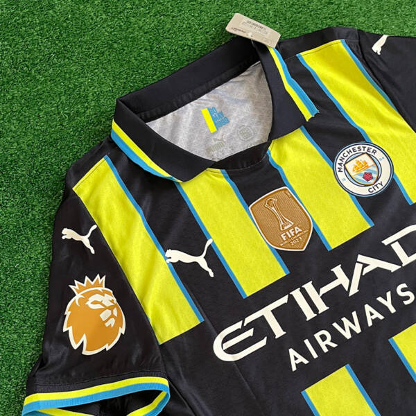 Maillot extérieur Manchester City 2025, design rétro vert