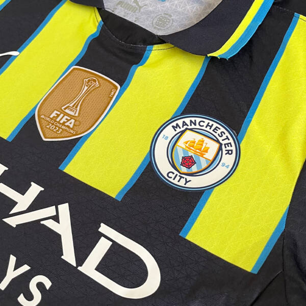 Maillot extérieur Manchester City 2025, design rétro vert