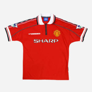 Maillot domicile Manchester United 1999, rouge légendaire.