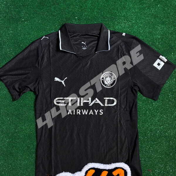 Maillot extérieur Manchester City 2026 noir et gris